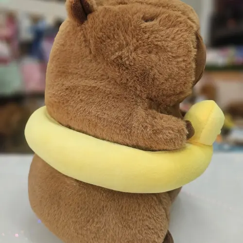 Capybara de peluche con flotador de patico's photo #1